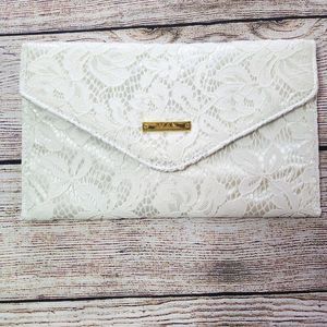 IMAN Winter White Envelope Lace Clutch with Snap Closure.